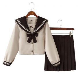 Beige school uniform with dark brown bow