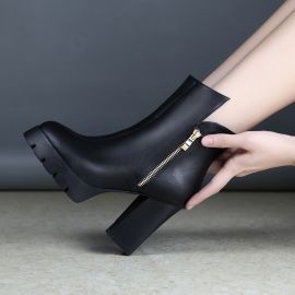 Black heeled leather shoes